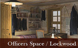 The images in this gallery provide a panoramic view of James Booth Lockwood's quarters. As we move 360 degrees around the space, we see Lockwood's bed with a desk beside a window. On the desk sits a telescope and some books. Clothing is hung above the bed. Also visible from Lockwood's space is Greely's quarters, the pendulum room, and a doorway leading to other areas of the expedition house