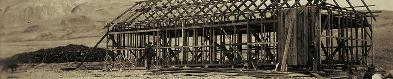 A historic photograph showing the construction of the expedition house used by the Lady Franklin Bay Expedition.