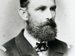 A portrait of Karl Weyprecht. He is dressed formally and has a beard. 