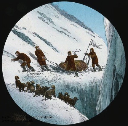A historic illustration showing a group of men and dogs precariously driving a sledge along a narrow ridge.
