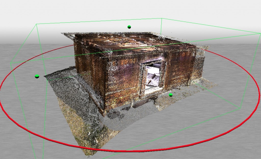 Laser Scanning: An image showing the point cloud of one of Peary's huts. Thousands of tiny dots for the image of the small rectangular hut. 